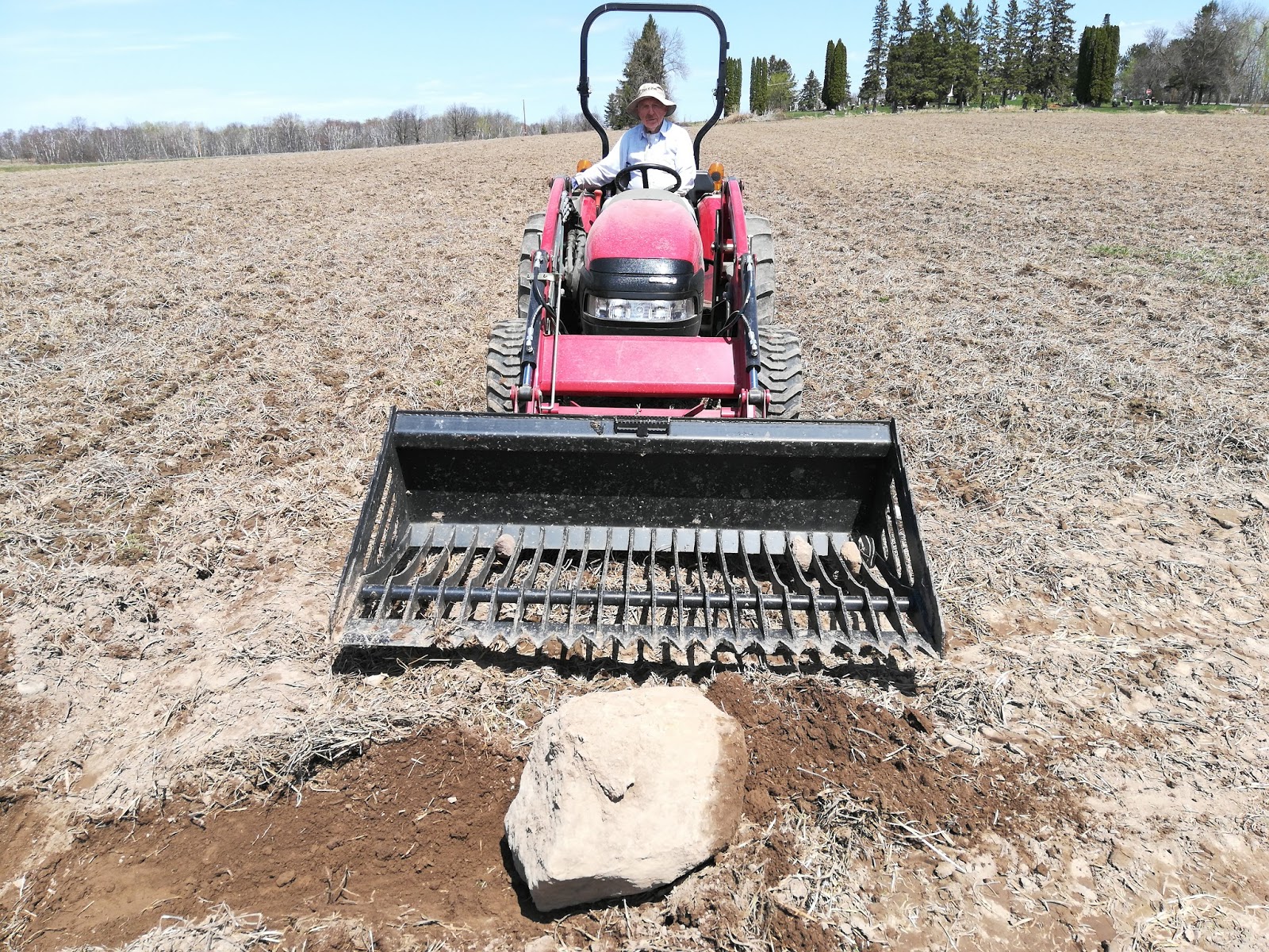 Grass Creek Farm Picking Rocks