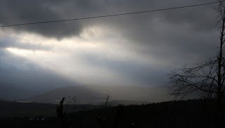Beautiful sunlight streams through a gap in the overcast Beautiful sunlight streams through a gap in the overcast