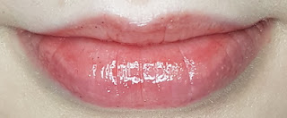 Dr. PawPaw Balm in Tinted Red Sparkle lip swatch