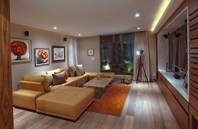Picture of the modern home theater room with yellow sofa