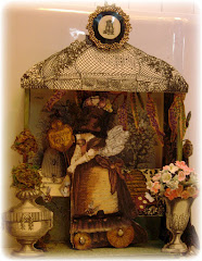 A shadow box made from a "Rhonda's Original" paper doll