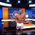 Gary Lineker presents match of the day in his underwear after promising to strip off if Leicester win the title (photos)