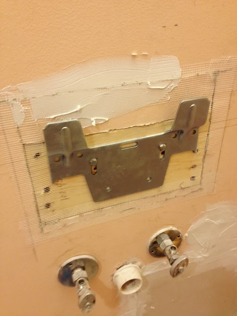 attaching bracket to 2x6 in wall