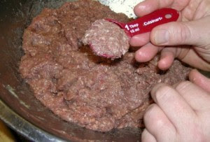 Use a table spoon measure to scoop out just the right amount of ground beef for uniform size of the Swedish Meatballs.