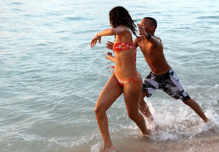 Rihanna Enjoying Holiday Time at Beach