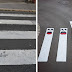 Artista de rua chama a atenção para as faixas de pedestres, transformando-as em diversão