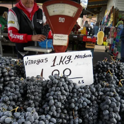 Best food markets in Europe: old-fashioned scale and grapes at Riga Central Market