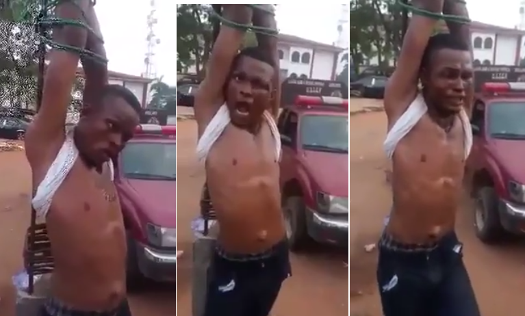 VIDEO:Armed Robber Caught In Ogun State, Stripped & Tied On A Pole.