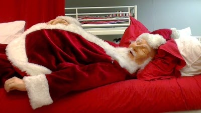 Santa crashes after a long night of delivering toys.