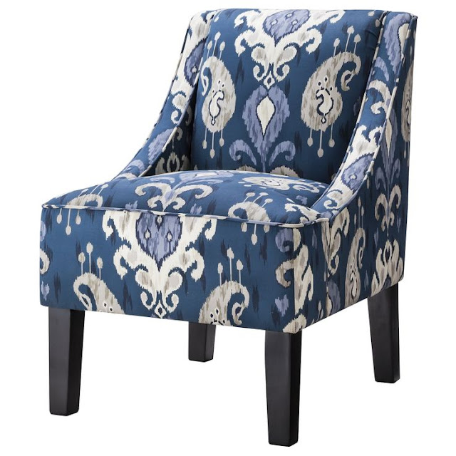 What I'm Loving Right Now: Ikat. Incorporate this trend into your home with this blue and white Ikat accent chair!