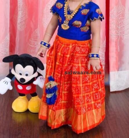 orange lehenga with blue blouse