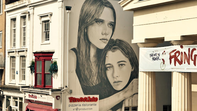While we last heard from him in France a few days ago, RONE is back in the United Kingdom and for once it's not London! The Aussie artist invaded the city of Brighton in Southern UK where he spent a few days working on this large-scale mural.