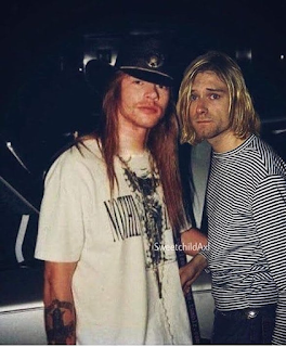 Axl Rose with Kurt Cobain photo. #PMRC PunkMetalRap.com