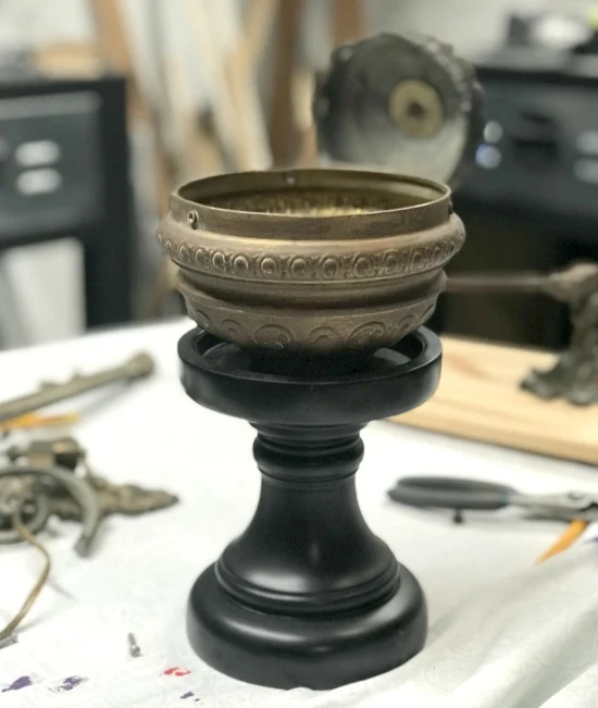 Repurposed lamp parts and candle stick planter