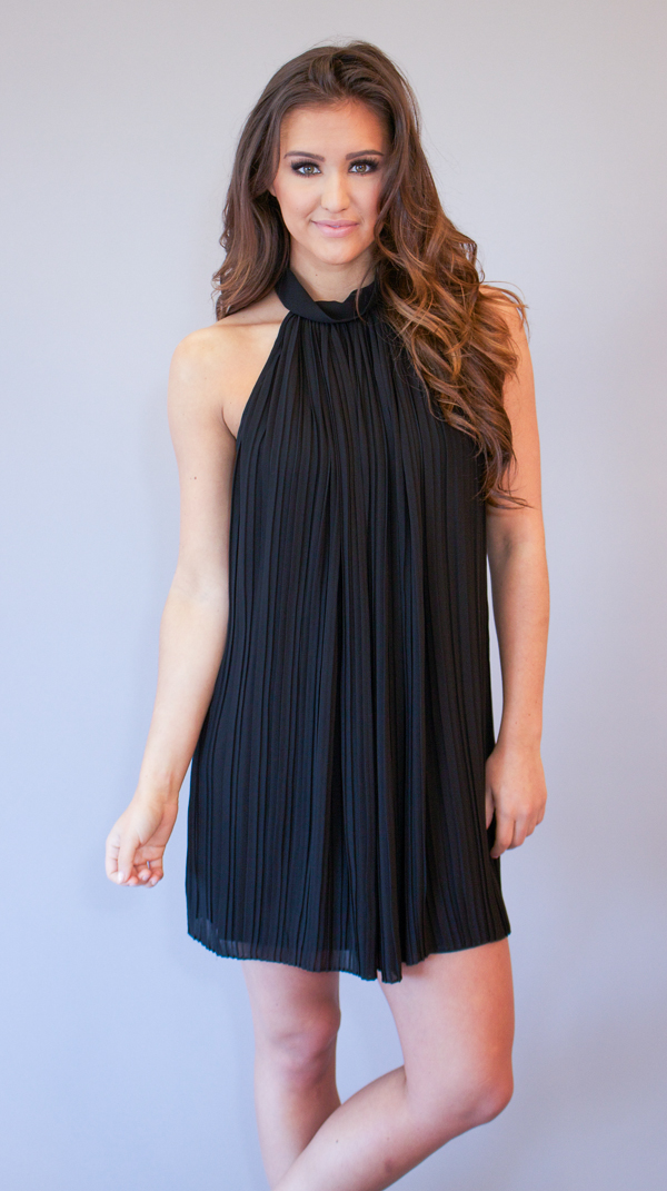black dress with gold zipper down the back
