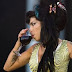 Ailing Amy Winehouse cancels part of European tour