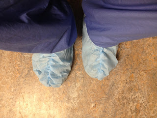 Picture of my feet in scrub booties.