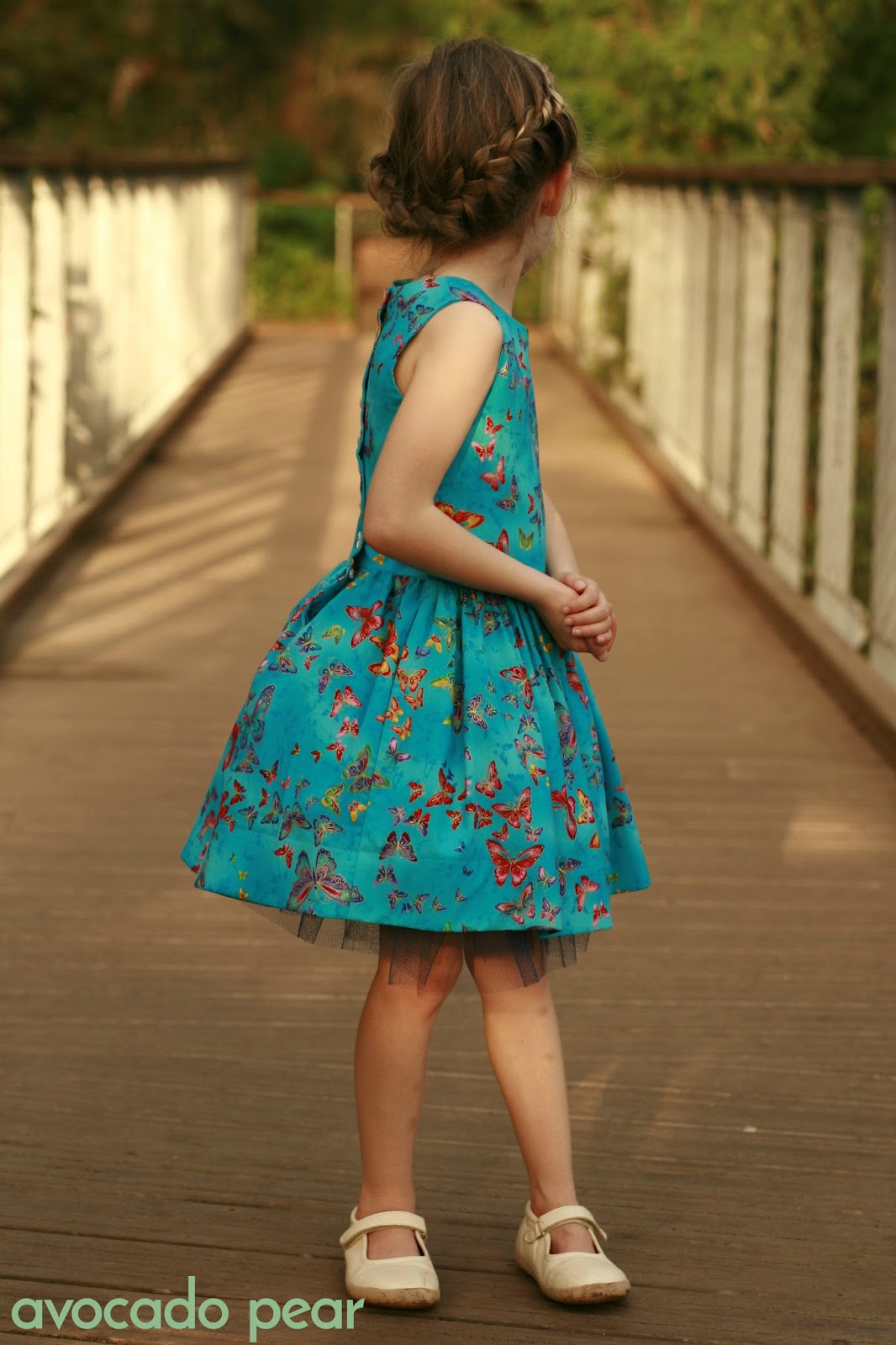 Latona girls dress blue butterflies front side view blue butterfly party dress
