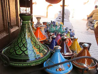 The cone-shaped lid of the tagine traps steam and returns the condensed liquid to the pot
