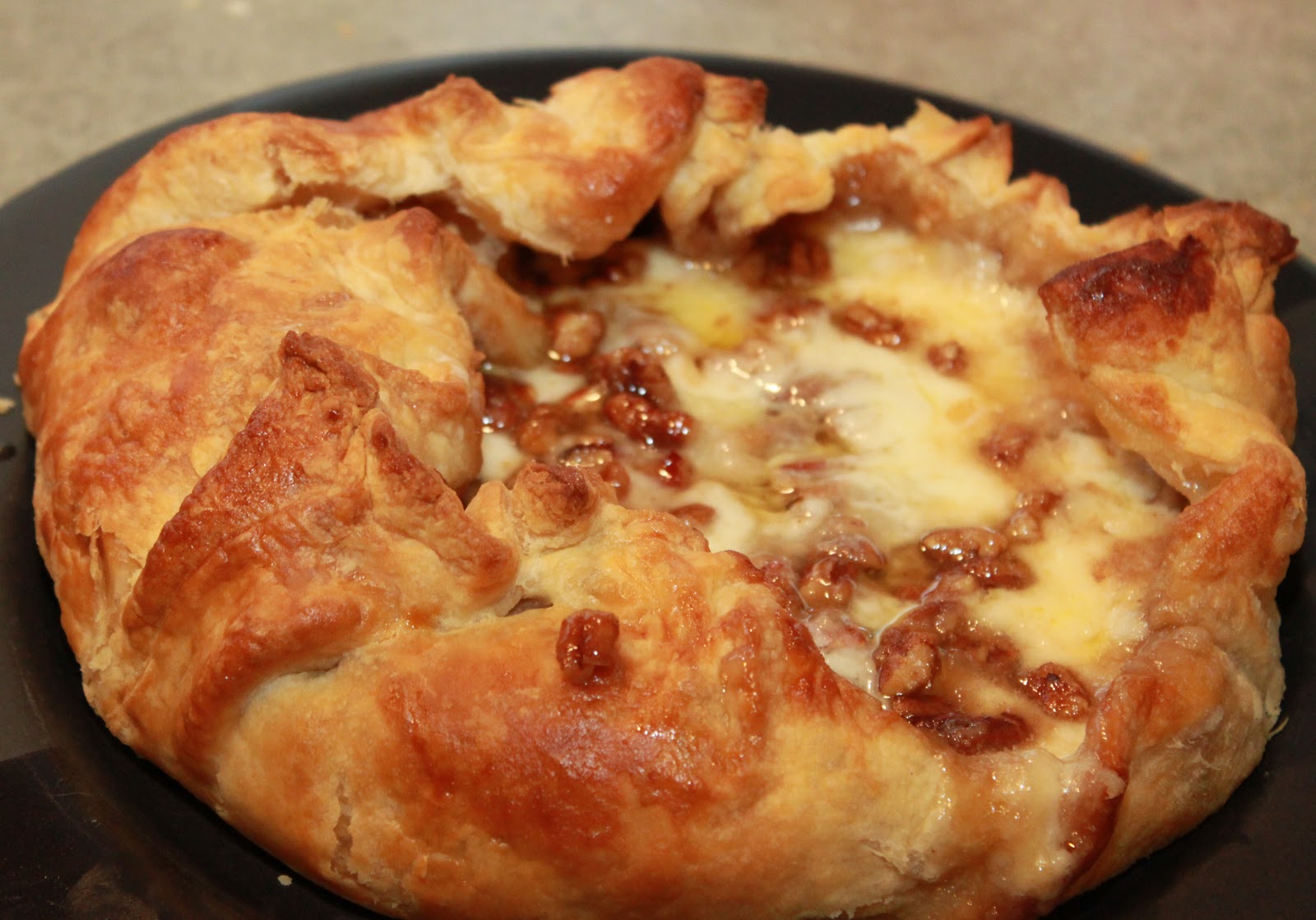 A Bowl of Creativity Baked Brie en Croute with Brown Sugar and Bourbon