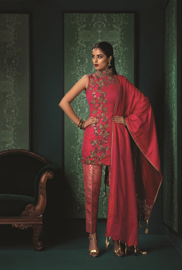 Garnet pink silk dupion fitted dupion with pink and gold brocade cigarette trousers by Designer Anuradha and Sharaddha Tikmani Garnet pink silk dupion fitted dupion with pink and gold brocade cigarette trousers by Designer Anuradha and Sharaddha Tikmani