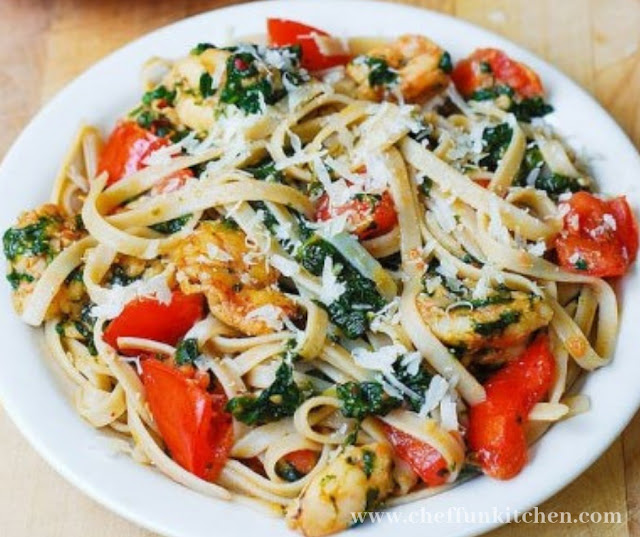Shrimp Tomato Spinach Pasta In Garlic Butter Sauce Shrimp Tomato Spinach Pasta In Garlic Butter Sauce
