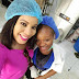 Monalisa Chinda takes a selfie With the production manager at the Wilson Juice Factory