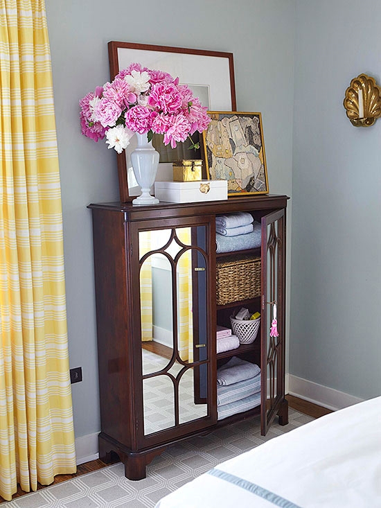Storage Solutions for Small Bedroom; With The Addition Of Glass, Ornate Roses And A Variety Of Other Accessories