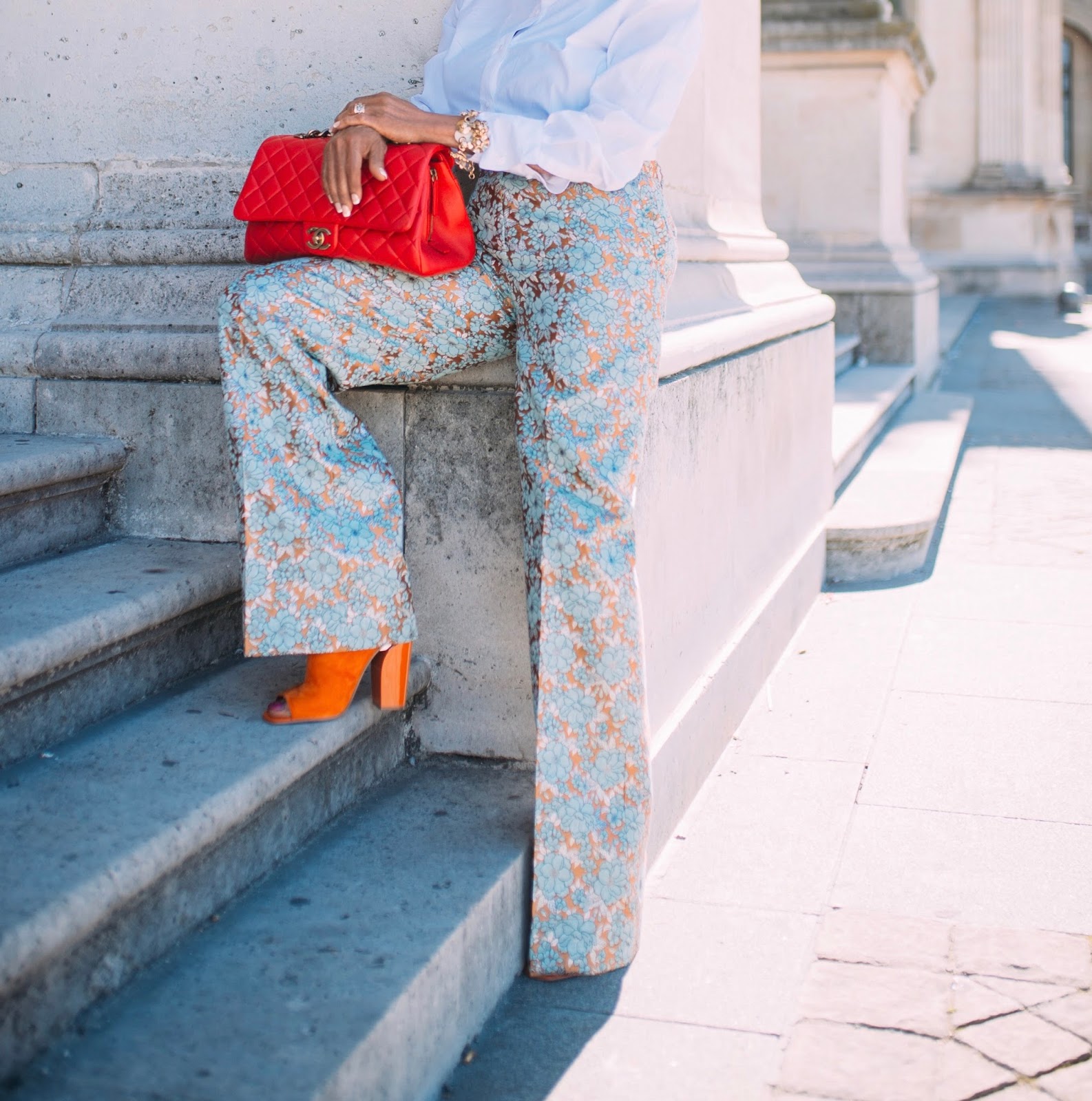 Floral jacquard pants with classic white shirt and boater hat