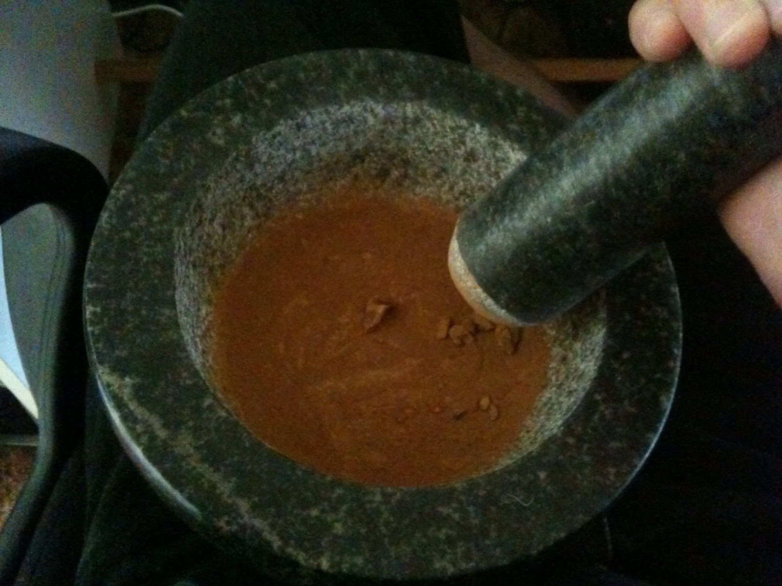 Making ochre paint by hand