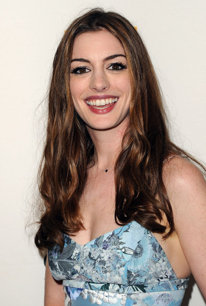 Anne Hathaway looks just okay in her pale blue printed Erdem dress