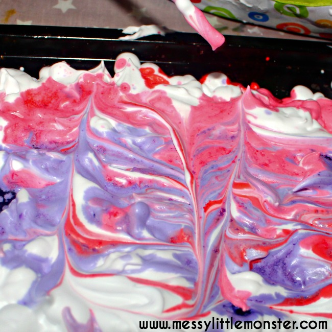 Easy kids marbled heart craft using shaving foam. A fun art and sensory heart activity for toddlers and preschoolers. Inspired by the story 'The day it Rained Hearts' and national reading month. 