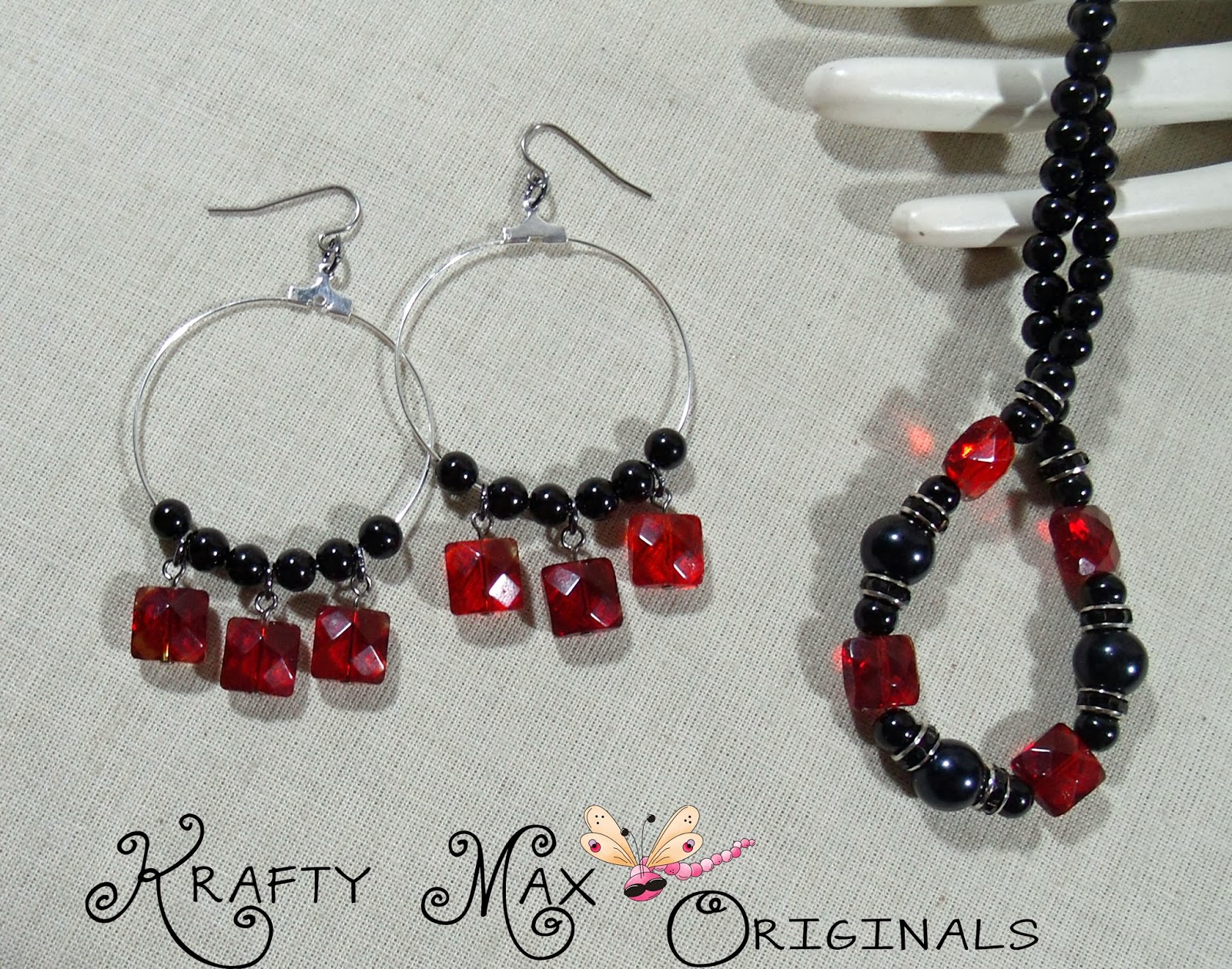 http://www.artfire.com/ext/shop/product_view/KraftyMax/8261951/red_and_black_beauty_prima_beads_blog_team_necklace_set/handmade/jewelry/sets/glass