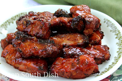 Country style ribs baked or grilled over indirect heat and brushed with a pepper jelly barbecue sauce.