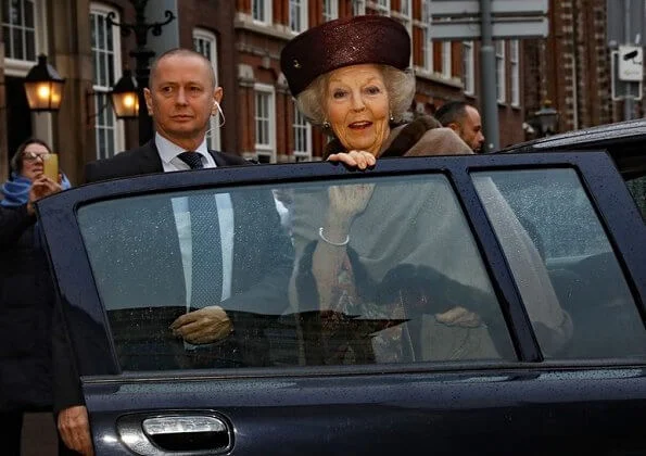 Princess Beatrix attended a symposium held on the occasion of Kingdom Day at the Council of State in The Hague