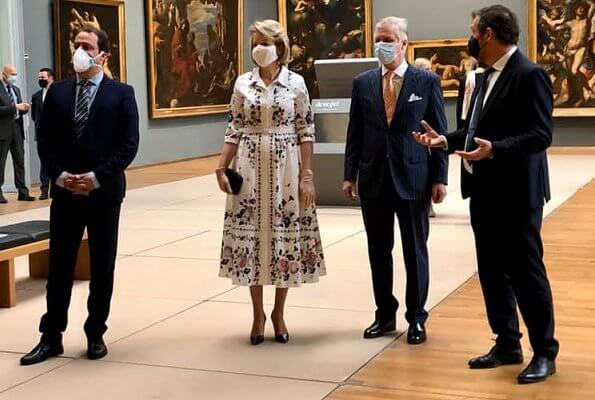 During her visit to the Old Masters Museum, Queen Mathilde wore a new floral print cotton shirt dress by Erdem