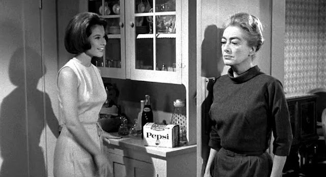 Strait Jacket, starring Joan Crawford. 1964. Joan was on the Pepsi board of directors and had Pepsi products placed in her movies. Jingles and other stories about The American Dream. marchmatron.com Strait Jacket, starring Joan Crawford. 1964. Joan was on the Pepsi board of directors and had Pepsi products placed in her movies. Jingles and other stories about The American Dream. marchmatron.com