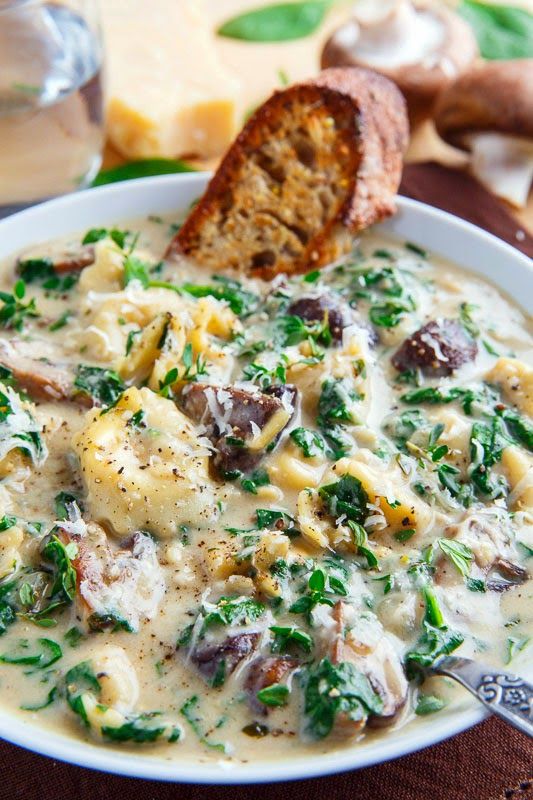 A hearty and tasty bowl of creamy mushroom and spinach soup with tortellini that is pure comfort food; perfect for cold winter days! A hearty and tasty bowl of creamy mushroom and spinach soup with tortellini that is pure comfort food; perfect for cold winter days!