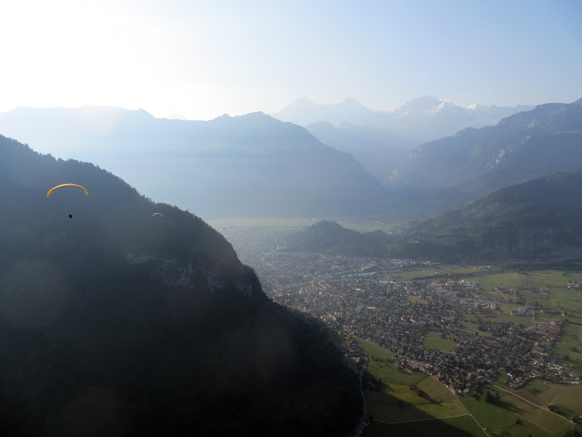 Paragliding 4000ft over the immense Swiss Alps in the home of adventure: Interlaken, Paragliding in Switzerland, How much does it cost to Paraglide, Is Paragliding safe, paraglide in Interlaken, adventure holiday, best place for adventure trip, geneve, Bern, The Alps, Alpine, skydive, fly, freedom, extreme sports, mountain, hike,