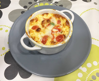 Clafoutis of cherry tomatoes, cheese and spinach