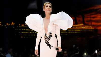 @InstaMag - Singer Celine Dion's sleeves on her gown she adorned at the Billboard Music Awards were packed up with tissue paper, according to her stylist Law Roach. celine-dion-wore-dress-packed-with-tissues