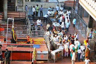 Devotee Taking Darshan at Shani Shingnapur Images