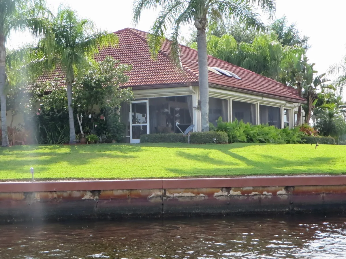 House along a channel at the edge of the Florida Everglades