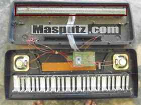 membongkar keyboard piano elektrik