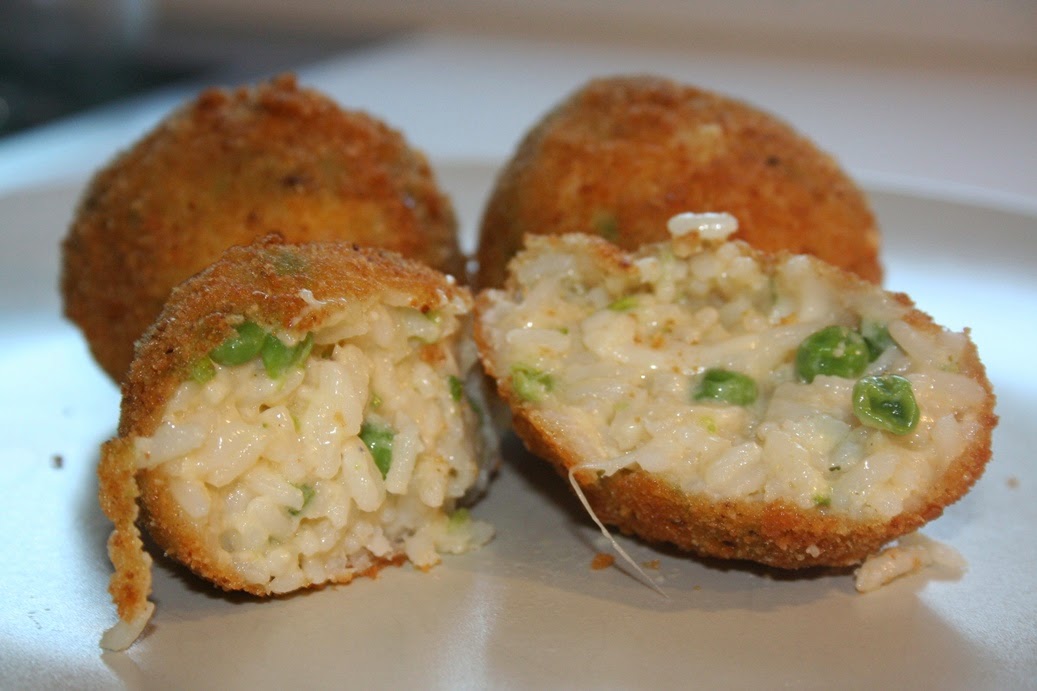 Arancini di riso con prosciutto e piselli Cotto e Postato