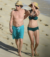 In an aqua trunks, Paul McCartney, 73, accompanied his beautiful 5 years lover, Nancy Shevell, 56, for walking in a green bikini as The couple seemed very enjoy the St Barts situation of beach on Sunday afternoon, December 27, 2015.