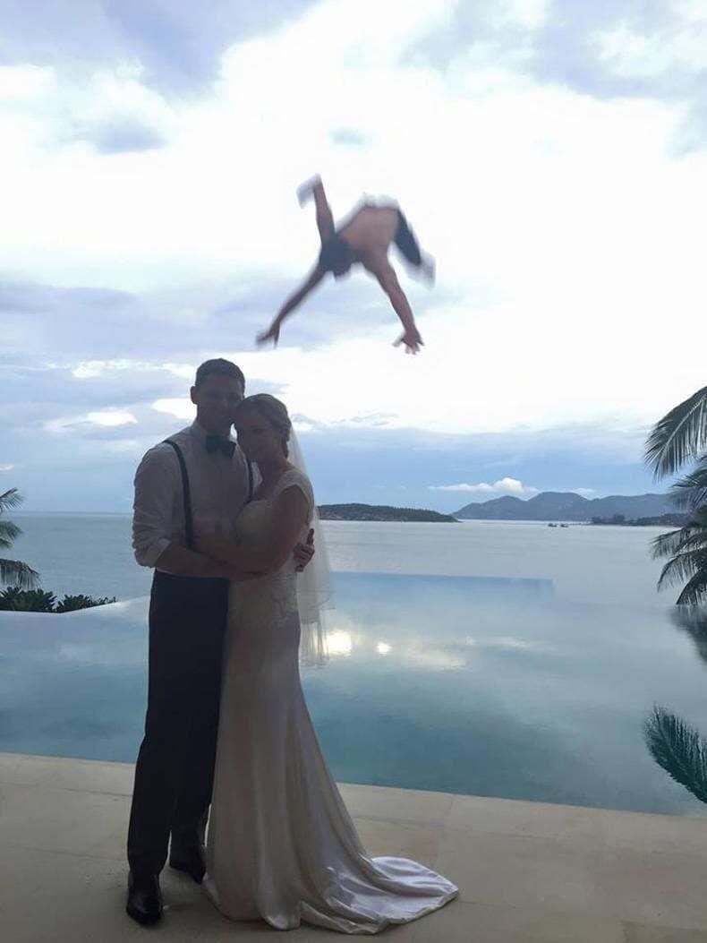 Naked guy flying in to crash their wedding shot ~