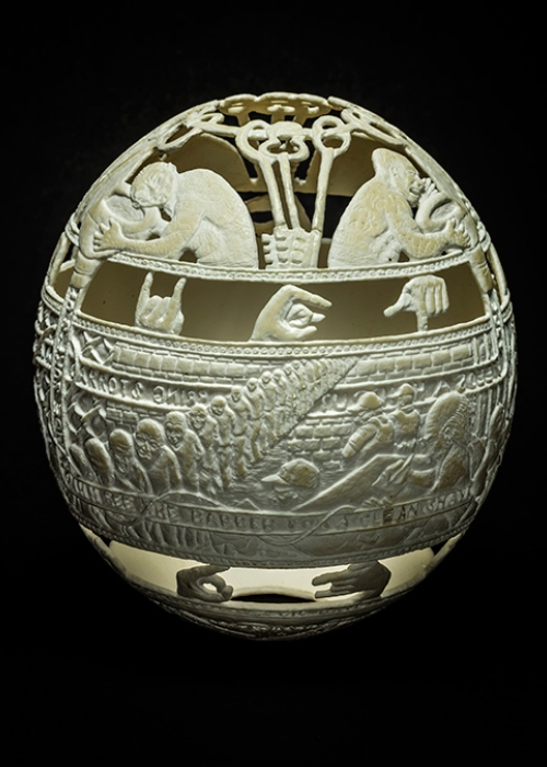 05-Ghost-Communication-Gil-Batle-Hatched-in-Prison-Carvings-on-Ostrich-Eggs-www-designstack-co