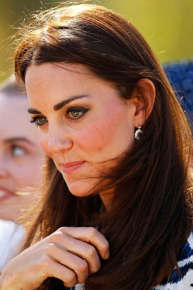 The shoes of Catherine, Duchess of Cambridge,and Prince William, Duke of Cambridge, are seen as they watch a Surf Life Saving...