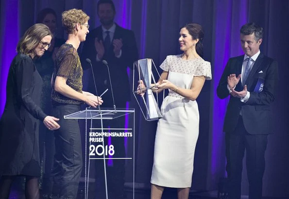 Danish filmmaker Annika Berg and Fundamentet, a social organization in Aaarhus. Ivory Brin Puffed Shoulder A-Line Midi Dress